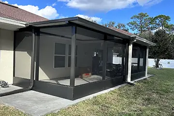 Screen room with elite insulated panel under existing roof
